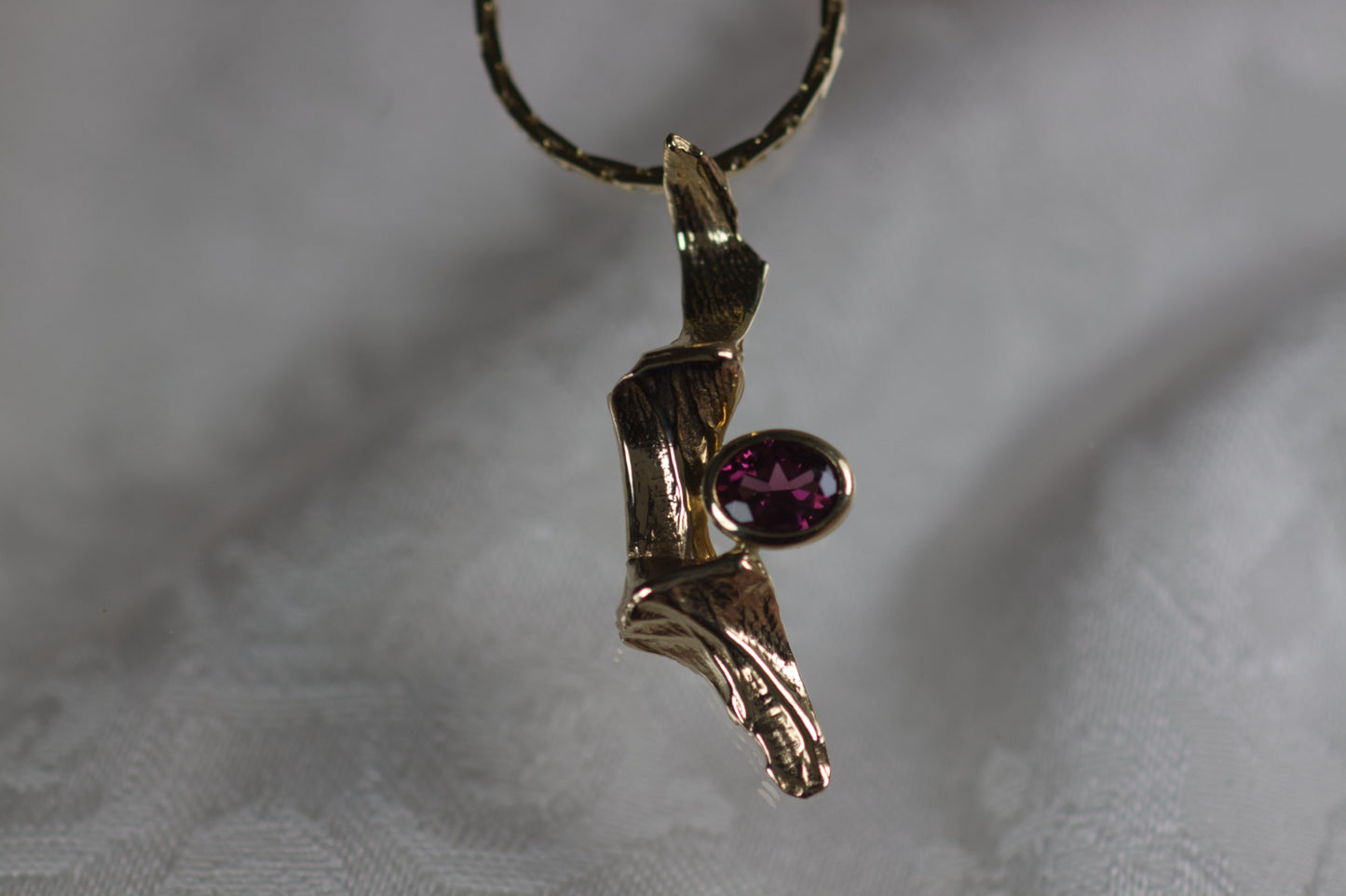 Fold Textured Rhodolite Garnet Oval Pendant